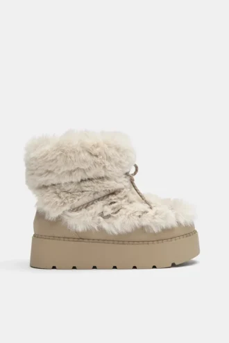 Bottes plates en fausse fourrure