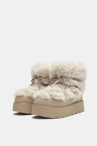 Bottes plates en fausse fourrure