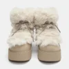 Bottes plates en fausse fourrure Bottes plates en fausse fourrure