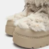 Bottes plates en fausse fourrure Bottes plates en fausse fourrure