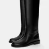 Bottes plates montant jusqu’aux genoux Bottes plates montant jusqu’aux genoux