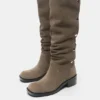 Bottes à talons hauts en cuir cloutées Bottes à talons hauts en cuir cloutées