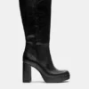 Bottes à talons hauts et semelles compensées Bottes à talons hauts et semelles compensées