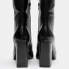 Bottes à talons hauts et semelles compensées Bottes à talons hauts et semelles compensées