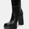 Bottes à talons hauts et semelles compensées Bottes à talons hauts et semelles compensées