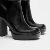 Bottes à talons hauts et semelles compensées Bottes à talons hauts et semelles compensées