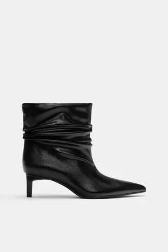 Bottes à talons hauts froncées