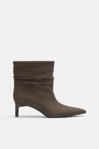 Bottes à talons hauts froncées