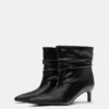 Bottes à talons hauts froncées Bottes à talons hauts froncées