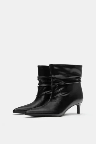 Bottes à talons hauts froncées