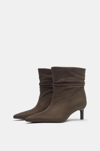 Bottes à talons hauts froncées