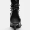 Bottes à talons hauts froncées Bottes à talons hauts froncées