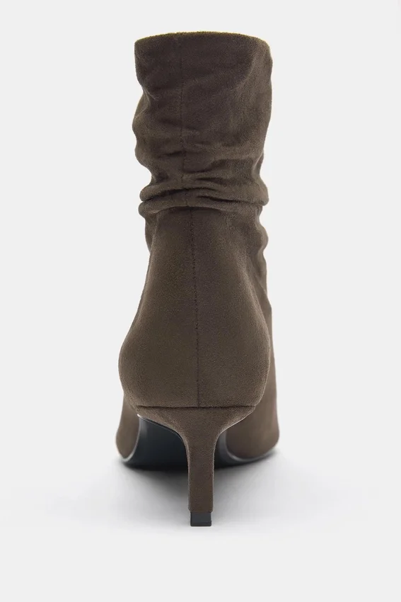 Bottes à talons hauts froncées Bottes à talons hauts froncées