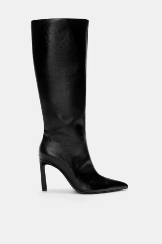 Bottes à talons hauts montant jusqu&rsquo;aux genoux