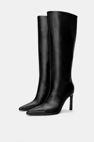 Bottes à talons hauts montant jusqu&rsquo;aux genoux