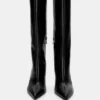 Bottes à talons hauts montant jusqu’aux genoux Bottes à talons hauts montant jusqu’aux genoux