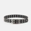 Ceinture en simili cuir avec œillets Ceinture en simili cuir avec œillets