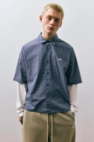 Chemise à carreaux à manches doubles