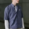 Chemise à carreaux à manches doubles