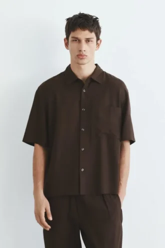 Chemise à manches courtes avec poche