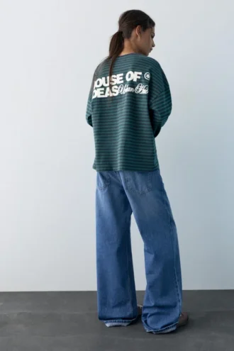Chemise à manches longues rayée avec inscription