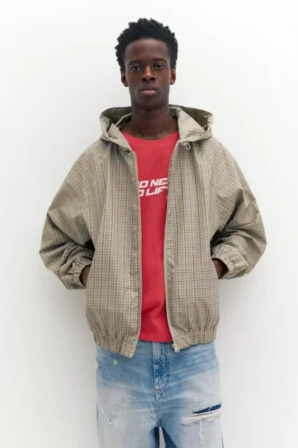 Imperméable léger à capuche à carreaux