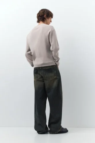 Jean à jambes larges avec ceinture contrastée