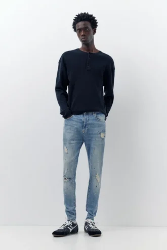 Jeans carotte à éclaboussures de peinture Jeans carotte à éclaboussures de peinture