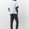 Jeans carotte à éclaboussures de peinture