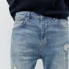 Jeans carotte à éclaboussures de peinture