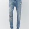 Jeans carotte à éclaboussures de peinture