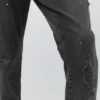 Jeans carotte à éclaboussures de peinture