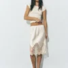 Jupe mi-longue style lingerie