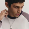 Lot comprenant un collier et une bague en pierre Lot comprenant un collier et une bague en pierre