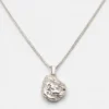 Lot comprenant un collier et une bague en pierre Lot comprenant un collier et une bague en pierre