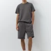 Lot comprenant un short de jogging et un T-shirt Lot comprenant un short de jogging et un T-shirt
