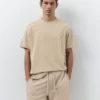 Lot comprenant un short de jogging et un T-shirt Lot comprenant un short de jogging et un T-shirt