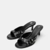 Mules à talons avec clous Mules à talons avec clous