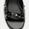 Mules à talons avec clous Mules à talons avec clous