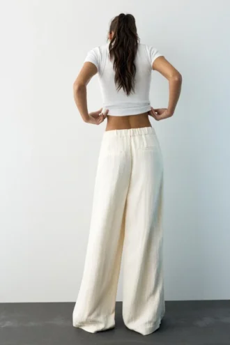 Pantalon ajusté à pinces