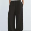 Pantalon de survêtement à jambes larges avec ourlet ajustable Pantalon de survêtement à jambes larges avec ourlet ajustable