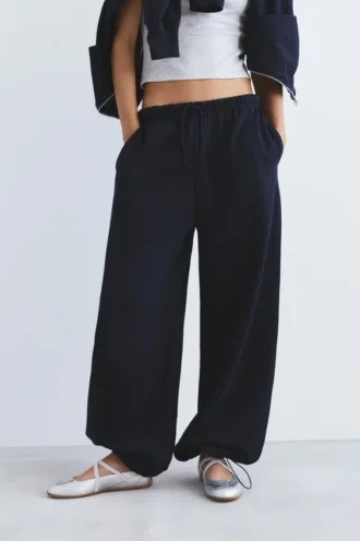 Pantalon de survêtement à jambes larges avec ourlet ajustable
