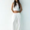 Pantalon à entrejambe tombant avec taille élastiquée Pantalon à entrejambe tombant avec taille élastiquée