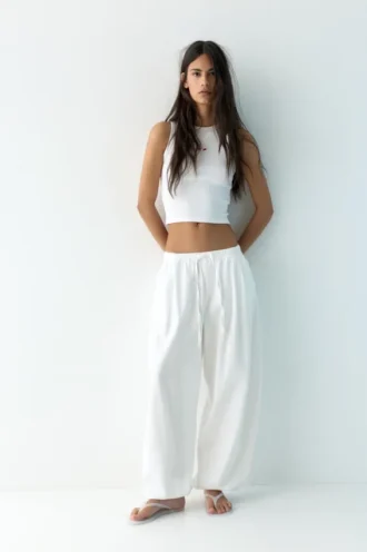 Pantalon à entrejambe tombant avec taille élastiquée