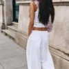 Pantalon à entrejambe tombant avec taille élastiquée Pantalon à entrejambe tombant avec taille élastiquée