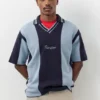 Polos en tricot rayés brodés