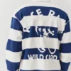 Polos rayés avec broderie représentant un cycliste Polos rayés avec broderie représentant un cycliste