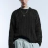Pull en maille torsadée délavé à l’acide Pull en maille torsadée délavé à l’acide