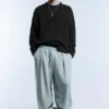 Pull en maille torsadée délavé à l’acide Pull en maille torsadée délavé à l’acide