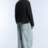 Pull en maille torsadée délavé à l’acide Pull en maille torsadée délavé à l’acide